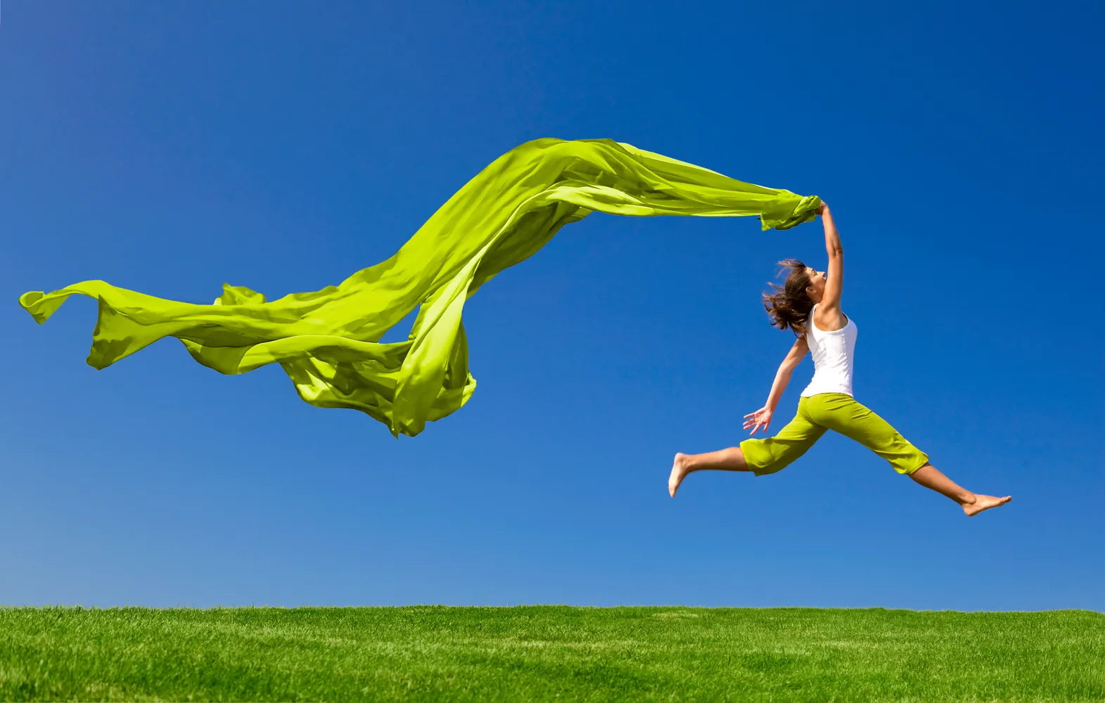 Woman celebrating an active, healthy lifestyle